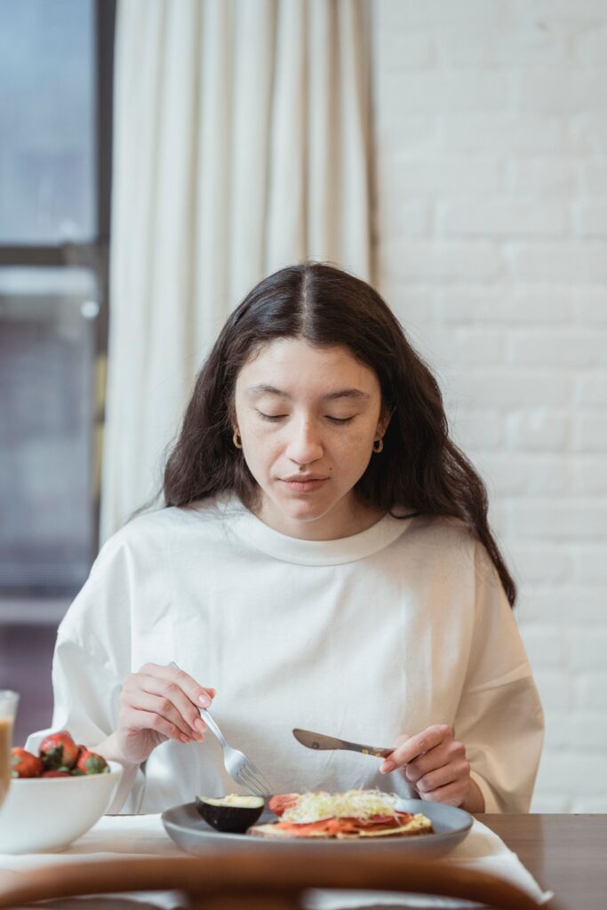 Woman enjoying a balanced meal